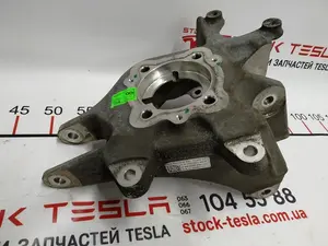 Кулак задній лівий (цапфа) Tesla model X 1027411-00-D
