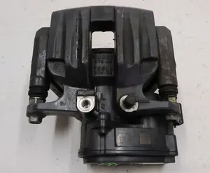 Супорт гальмівний задній лівий MANDO без накладки та гальмівних колодок TESLA Tesla model S REST