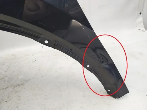 Błotnik przedni lewy uszkodzony PMNG MIDNIGHT SILVER Tesla model Y 1493451-12-A